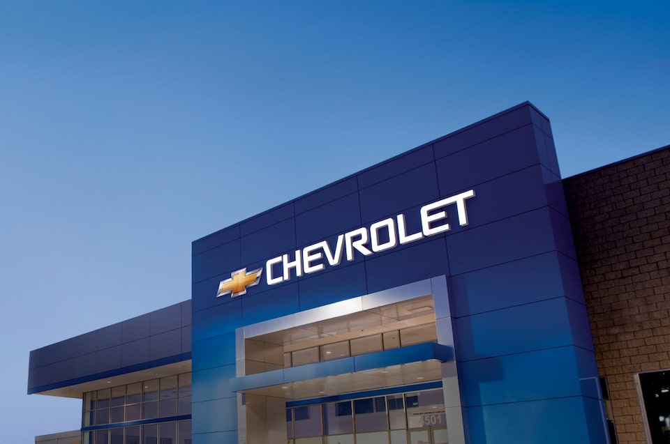 Anuncio titulado 'Próximo acto', incluyendo horarios de cierre, sorteo y lectura de resultados, junto a fotografía del edificio Chevrolet, sección informativa de la suscripción digital Chevrolet.