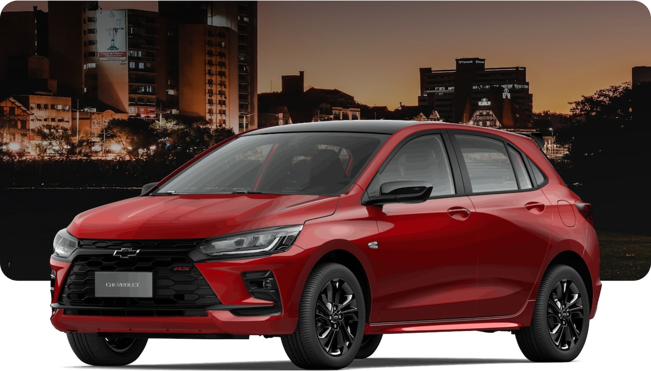 Vista en ángulo de tres cuartos frontal del nuevo auto Chevrolet Onix Hatchback 2027 versión RS Turbo AT color rojo, resaltando su aspecto deportivo y dinámico con detalles exclusivos en negro para Argentina.