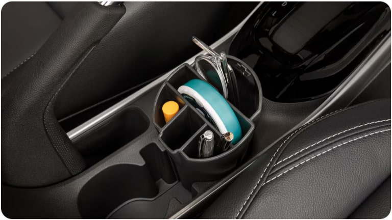 Organizador interno de portavasos para el Chevrolet Onix.