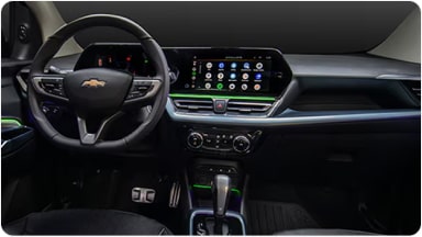 Vista frontal del panel central iluminado con el sistema LED RGB ambiental, permitiendo personalizar la atmósfera en la nueva Chevrolet Spin en Argentina.