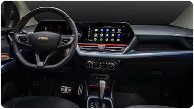 Vista frontal del panel central iluminado con el sistema LED RGB ambiental, permitiendo personalizar la atmósfera en la nueva Chevrolet Spin en Argentina.