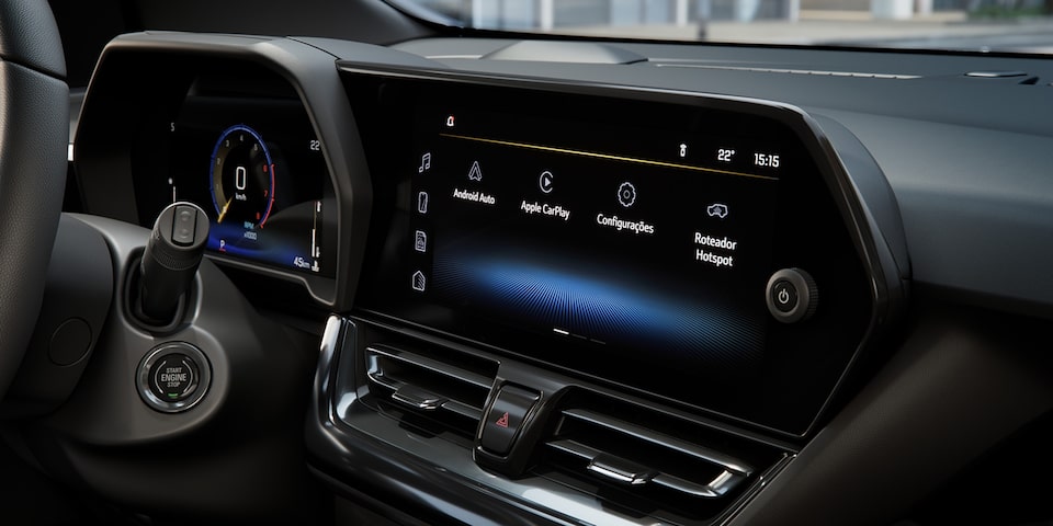 Panel multimedia y botón de encendido del Chevrolet Spin 2026, tecnología avanzada para una experiencia de manejo conectada y conveniente.