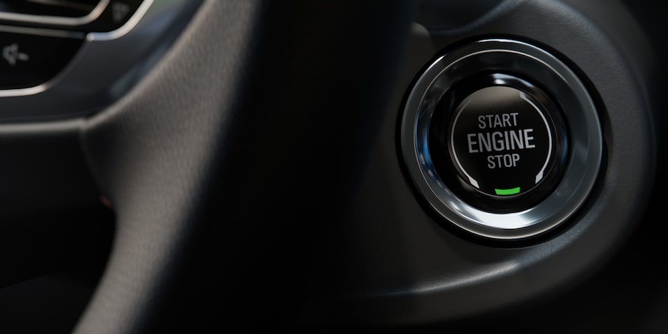 Botón de encendido del Chevrolet Spin 2026, tecnología avanzada que brinda facilidad y comodidad al iniciar tu viaje.