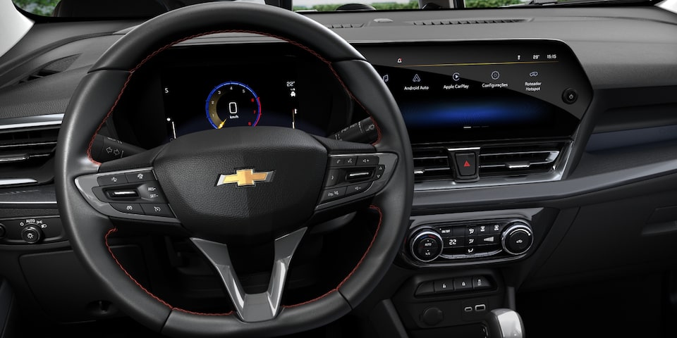 Panel multimedia y botón de encendido del Chevrolet Spin 2026, tecnología avanzada para una experiencia de manejo conectada y conveniente.