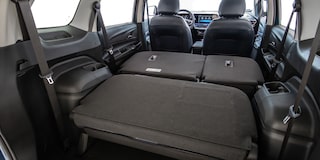 Interior del Chevrolet Spin 2026 con asientos confortables y amplio espacio, ideal para viajes familiares con máxima comodidad.