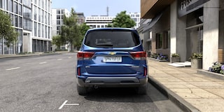 Interior del Chevrolet Spin 2026 con fácil acceso a la tercera fila de asientos, ideal para familias que buscan practicidad y espacio.