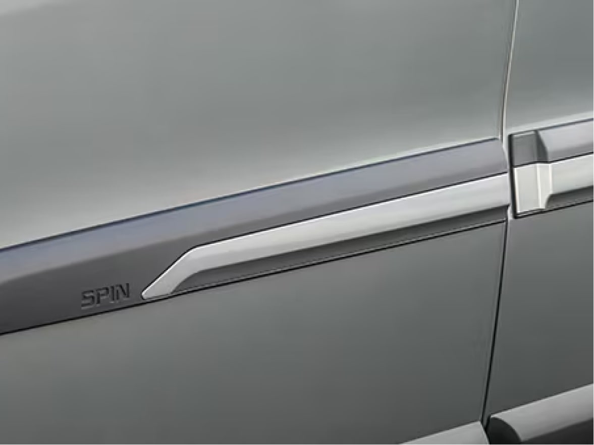 Detalle de la moldura de acceso resinada exclusiva de Spin, representando la protección que brinda el paquete de accesorios de Seguridad en Argentina.