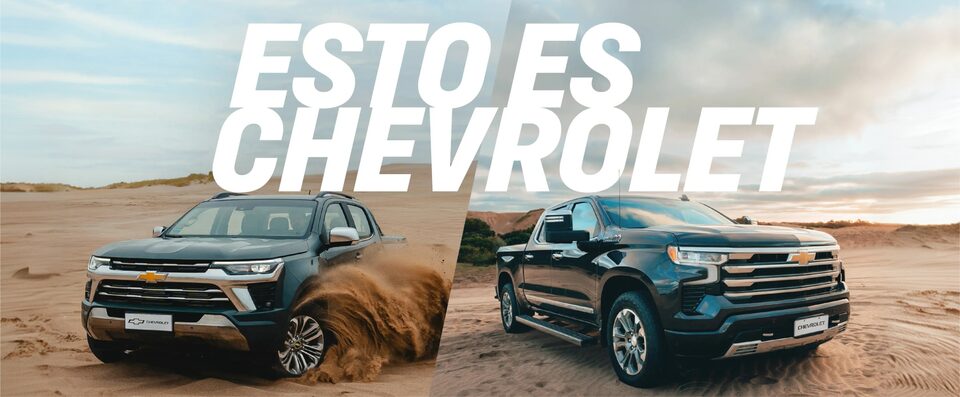 Banner con la frase Esto es Chevrolet,  con la imagen de dos camionetas Chevrolet en la arena, una de ellas derrapando.